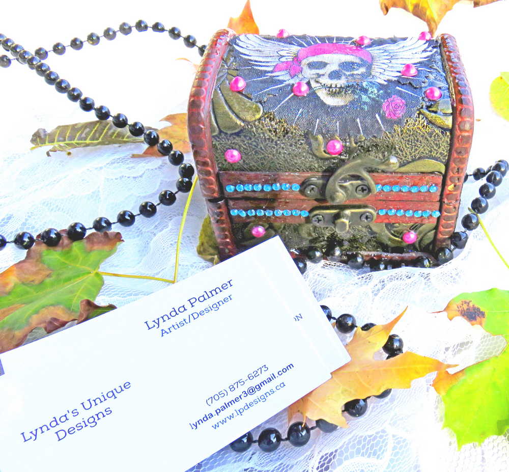 Business Card Holder like no other.  Fabric Skull with Wings Wearing a Burgundy Head Scarf