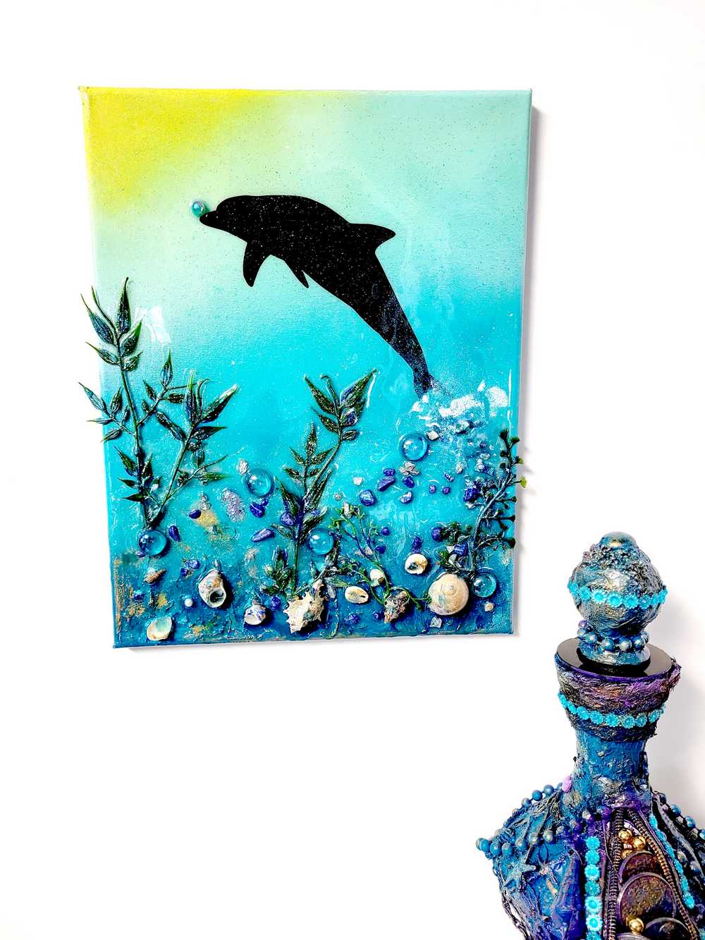 3D Canvas Resin Art with a Silhouette of a Dolphin, Seashells, Rocks and Foliage, 30 x 40 cm