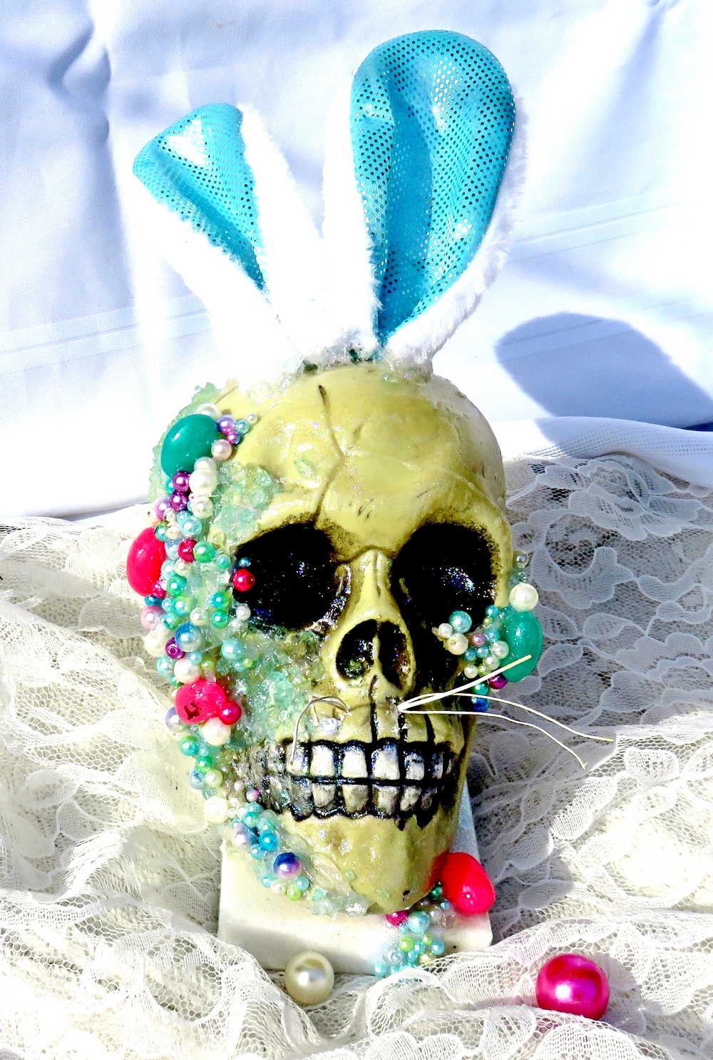 Resin Encased Easter Bunny Skull with Jelly Beans, Pearls & Glitter on a Marble Base