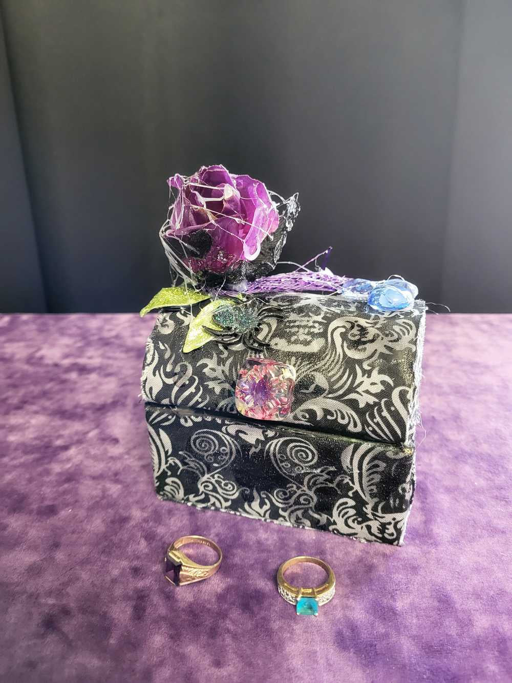 Hump Back Jewelry, Stash, Trinket Box, Covered with Black Skull Fabric, a Purple Rose, Blue Glass Cabochons, Spider,