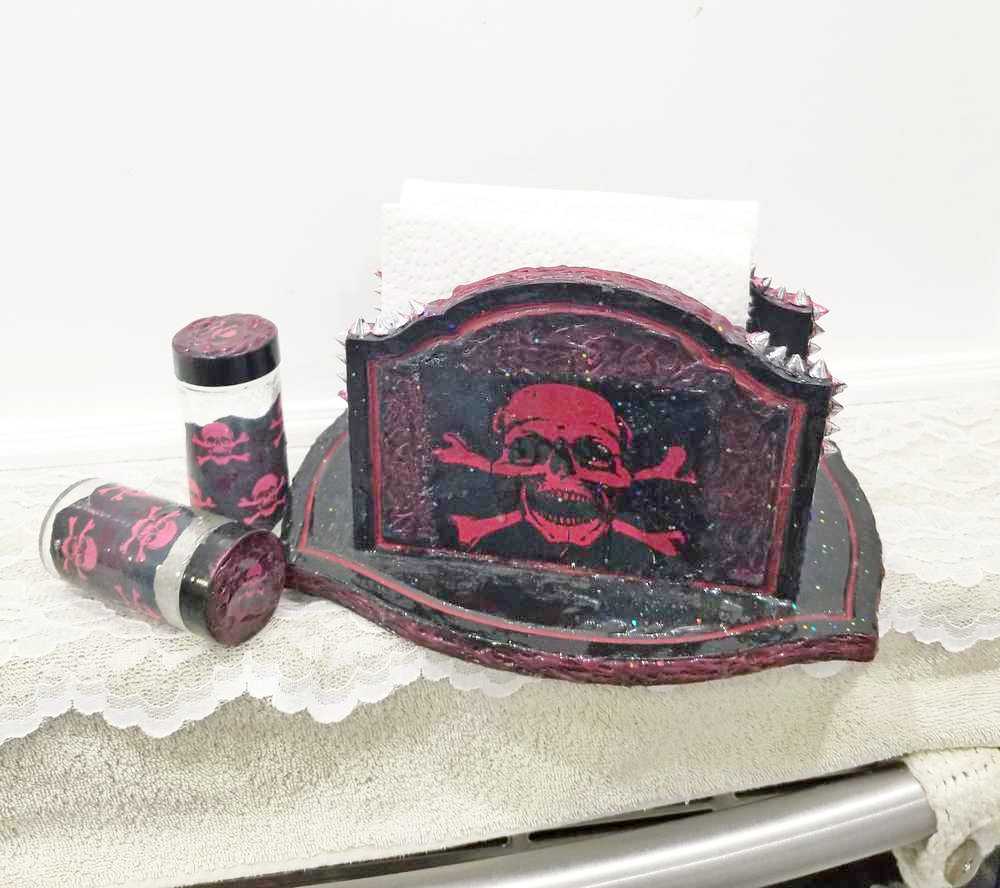 Black & Red Napkin Holder with Salt & Pepper Shakers Decorated with Red Cross & Bones Skull