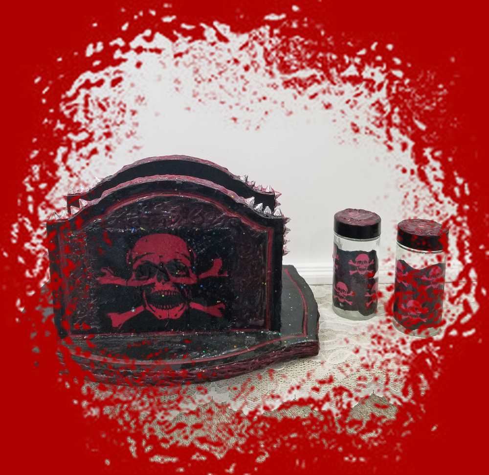 Black & Red Napkin Holder with Salt & Pepper Shakers Decorated with Red Cross & Bones Skull