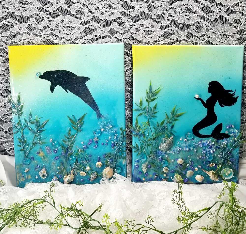 3D Resin Canvas Art of a Beautiful Silhouette of a Mermaid, a Glass Sea Turtle, Seashells, Greenery and Stones