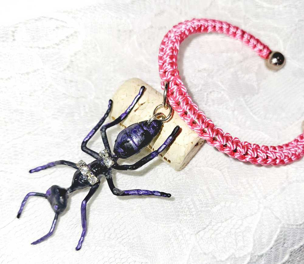 Eerie, Creepy Braided Pink Adjustable Bracelet with an Enormous Black Ant with Hint of Purplle Accents and Clear Rhinestones Across its Back