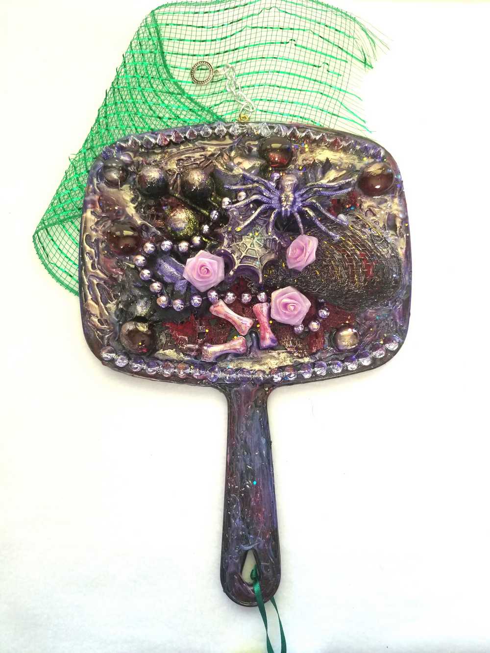 Black Hand Held Mirror with Bones, Roses, a Purple Spider and Her Web