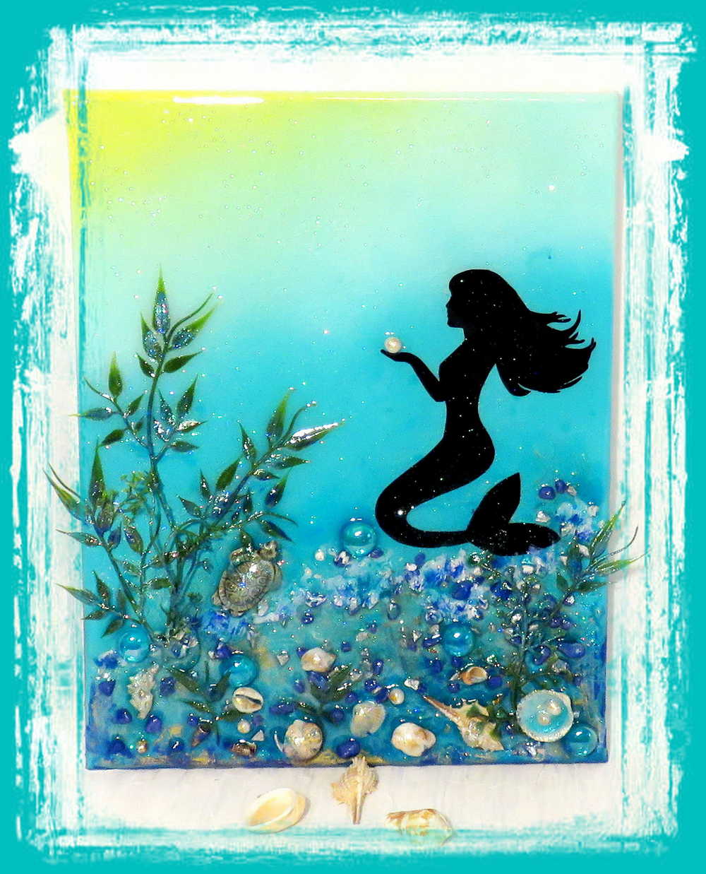 3D Resin Canvas Art of a Beautiful Silhouette of a Mermaid, a Glass Sea Turtle, Seashells, Greenery and Stones