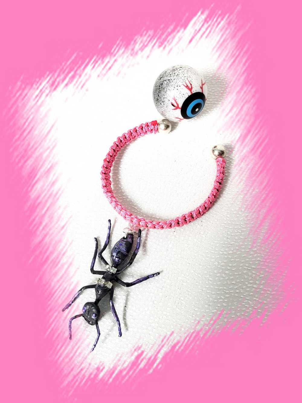 Eerie, Creepy Braided Pink Adjustable Bracelet with an Enormous Black Ant with Hint of Purplle Accents and Clear Rhinestones Across its Back