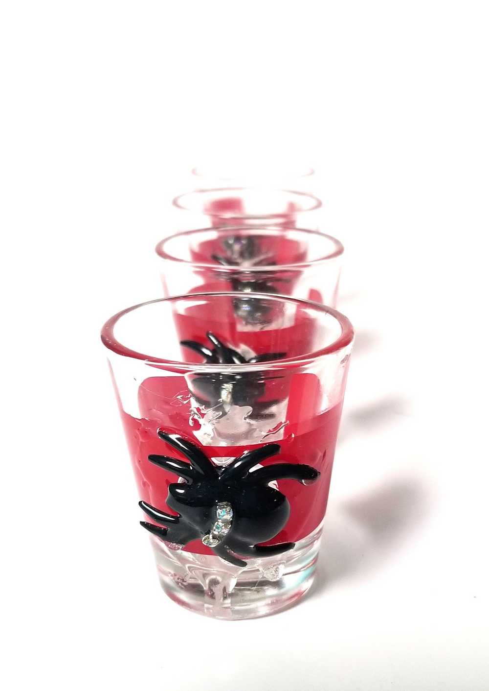 4 Shot Glasses in Red with Black Spiders with Rhinestones