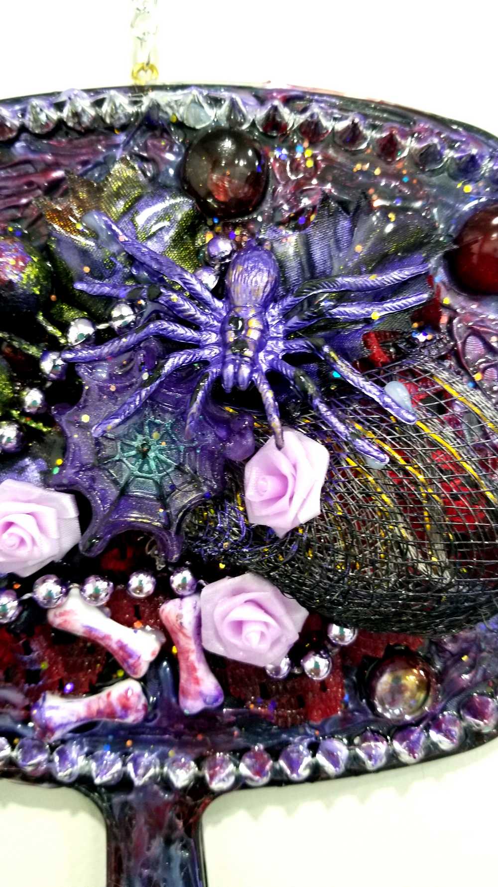 Black Hand Held Mirror with Bones, Roses, a Purple Spider and Her Web
