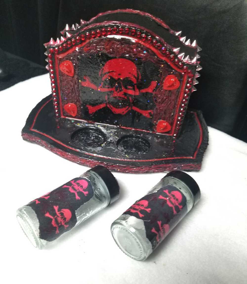 Black & Red Napkin Holder with Salt & Pepper Shakers Decorated with Red Cross & Bones Skull
