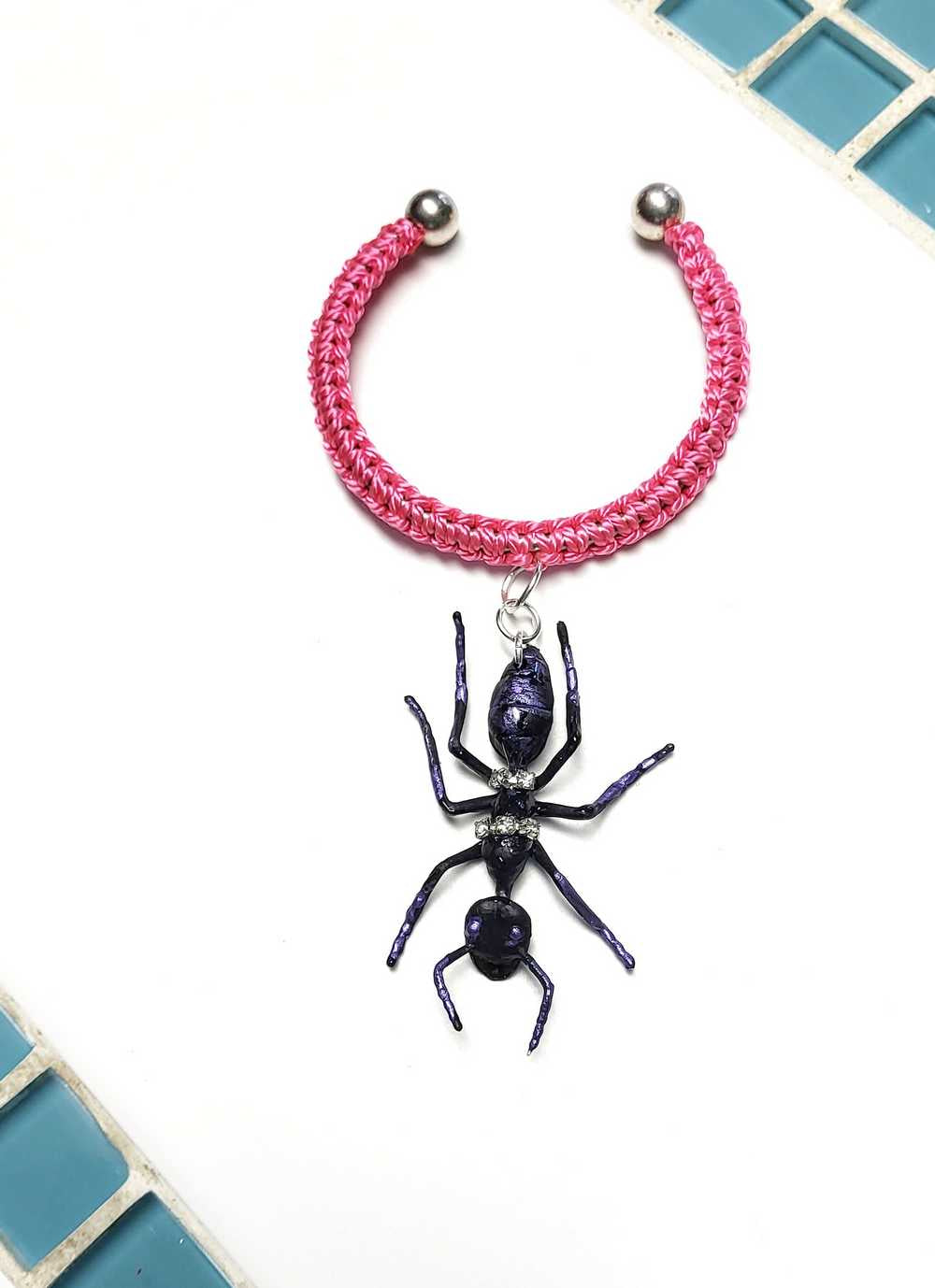 Eerie, Creepy Braided Pink Adjustable Bracelet with an Enormous Black Ant with Hint of Purplle Accents and Clear Rhinestones Across its Back