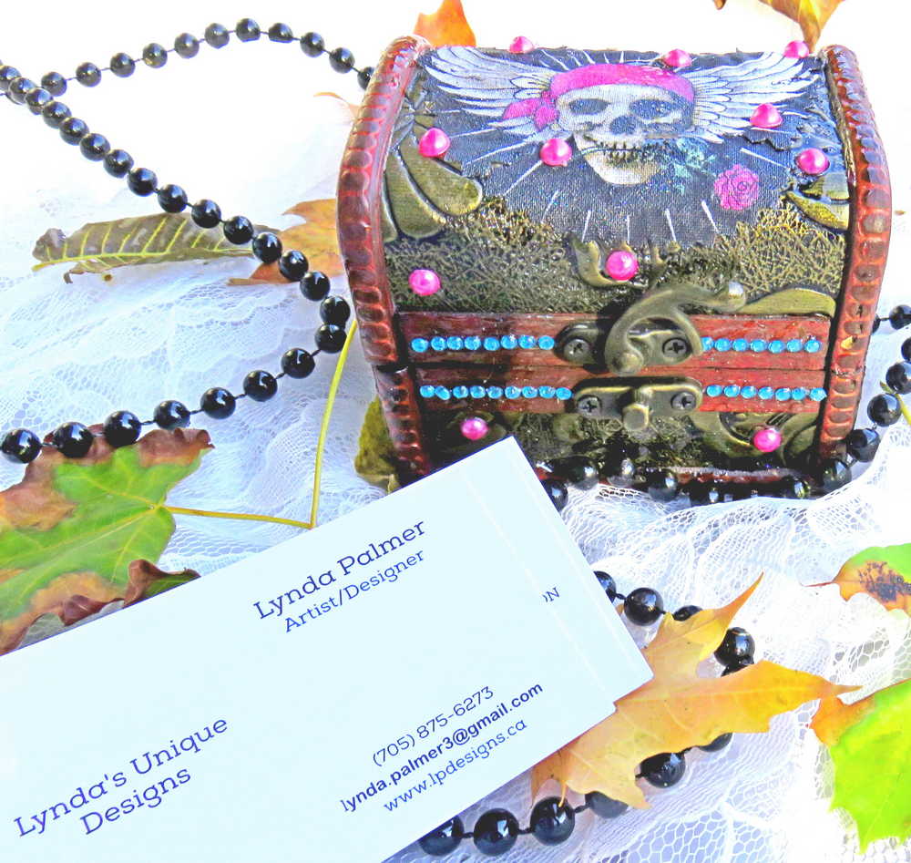 Business Card Holder like no other.  Fabric Skull with Wings Wearing a Burgundy Head Scarf
