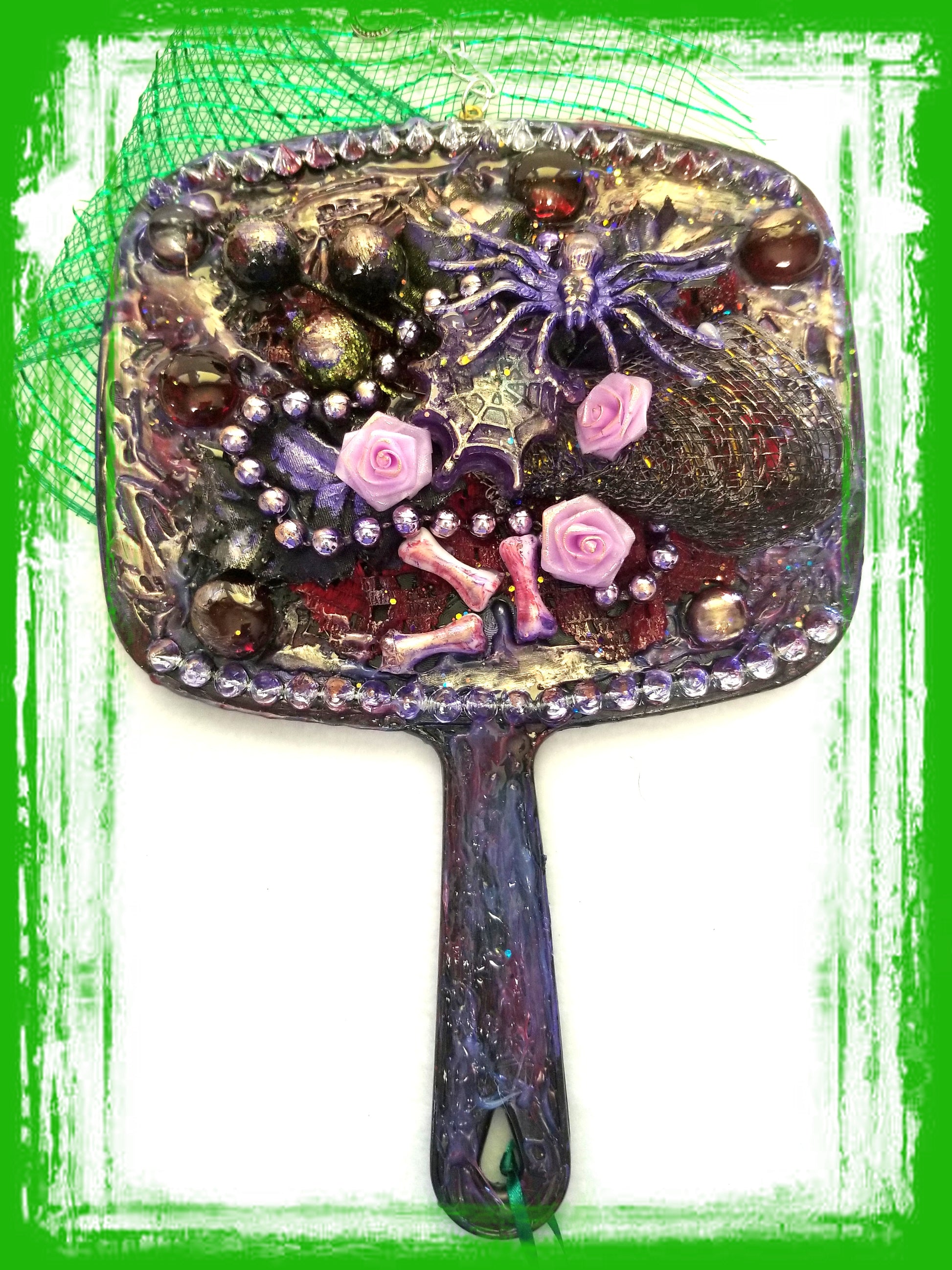 Black Hand Held Mirror with Bones, Roses, a Purple Spider and Her Web