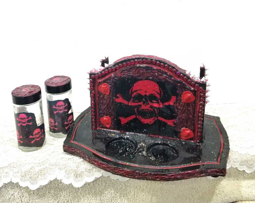 Black & Red Napkin Holder with Salt & Pepper Shakers Decorated with Red Cross & Bones Skull