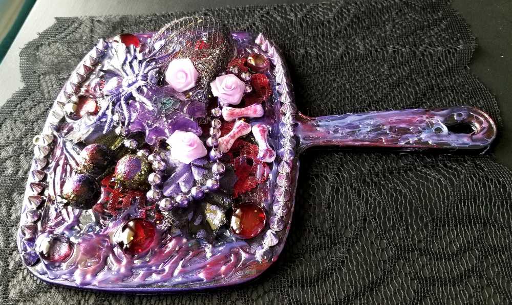 Black Hand Held Mirror with Bones, Roses, a Purple Spider and Her Web