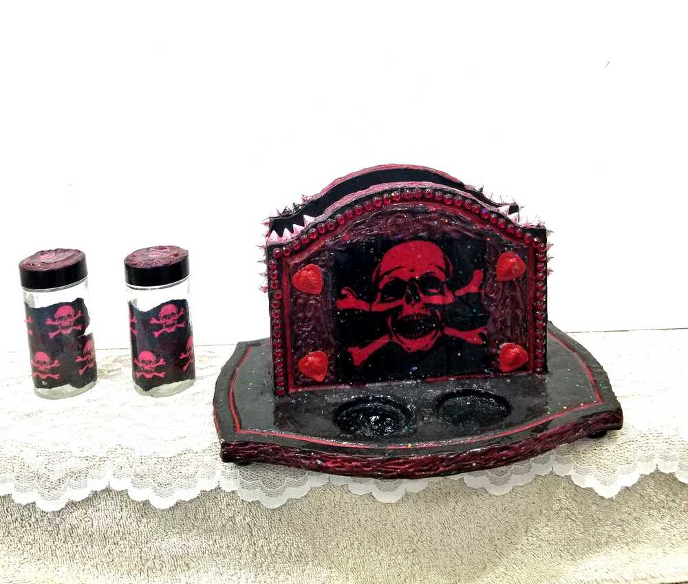 Black & Red Napkin Holder with Salt & Pepper Shakers Decorated with Red Cross & Bones Skull