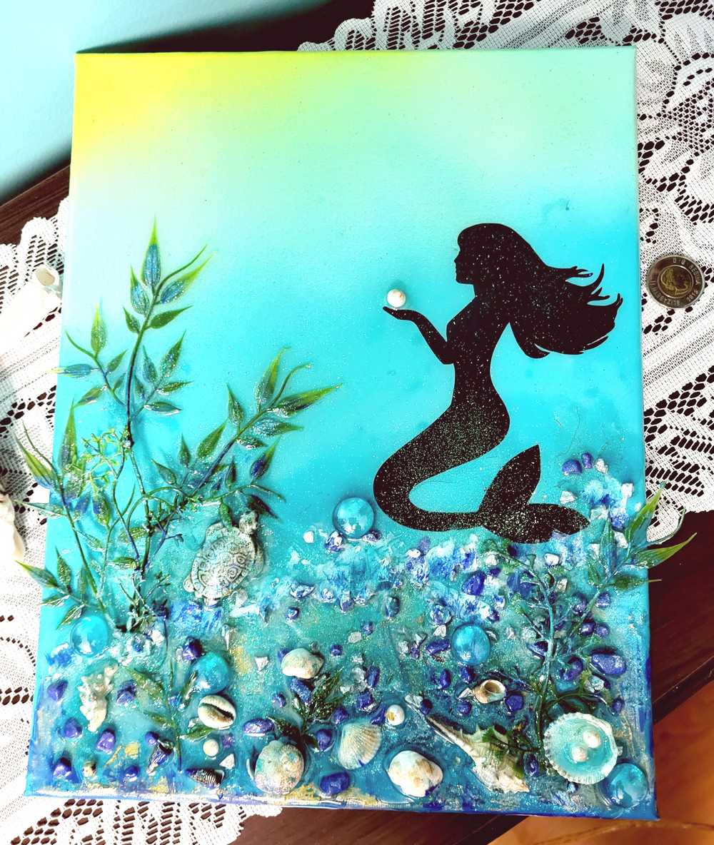 3D Resin Canvas Art of a Beautiful Silhouette of a Mermaid, a Glass Sea Turtle, Seashells, Greenery and Stones