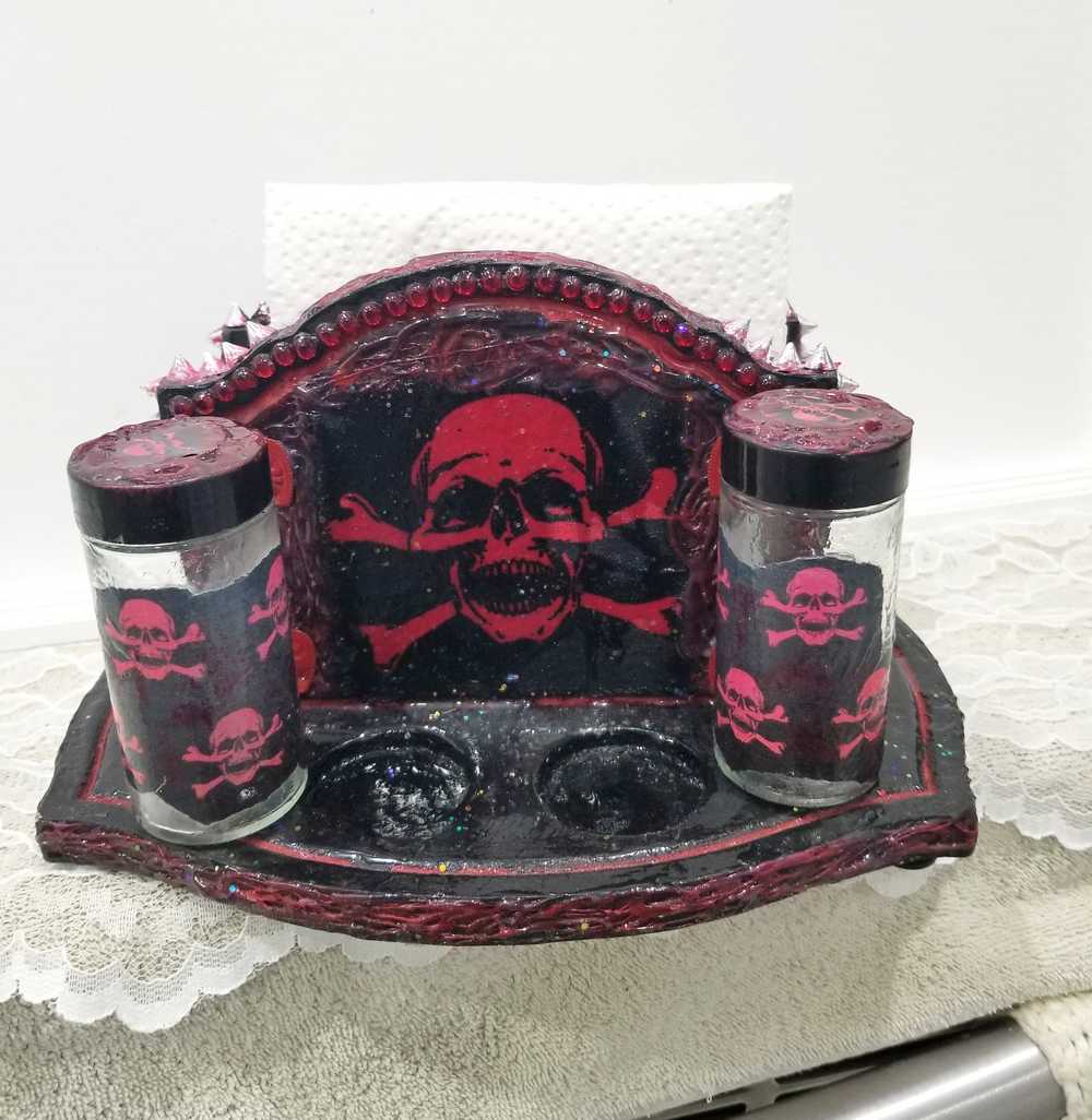 Black & Red Napkin Holder with Salt & Pepper Shakers Decorated with Red Cross & Bones Skull