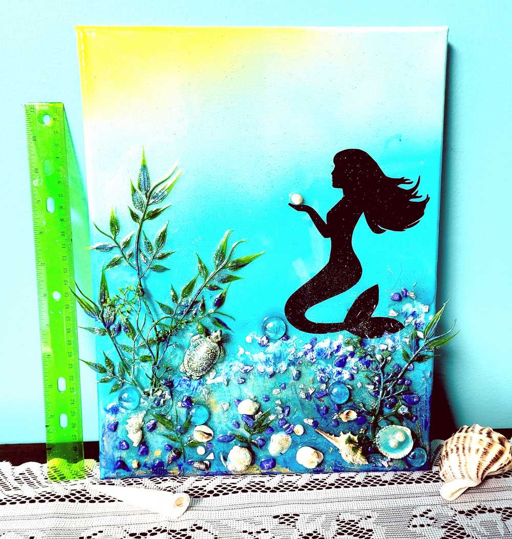 3D Resin Canvas Art of a Beautiful Silhouette of a Mermaid, a Glass Sea Turtle, Seashells, Greenery and Stones