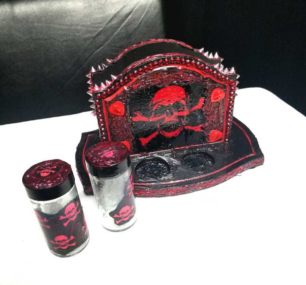 Black & Red Napkin Holder with Salt & Pepper Shakers Decorated with Red Cross & Bones Skull