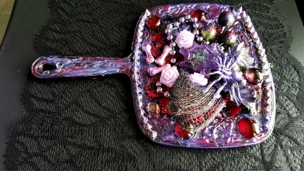 Black Hand Held Mirror with Bones, Roses, a Purple Spider and Her Web