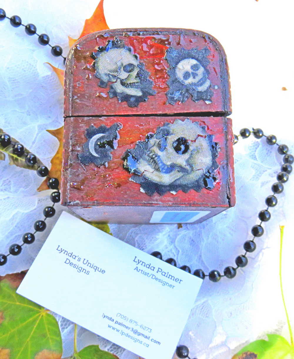 Business Card Holder like no other.  Fabric Skull with Wings Wearing a Burgundy Head Scarf