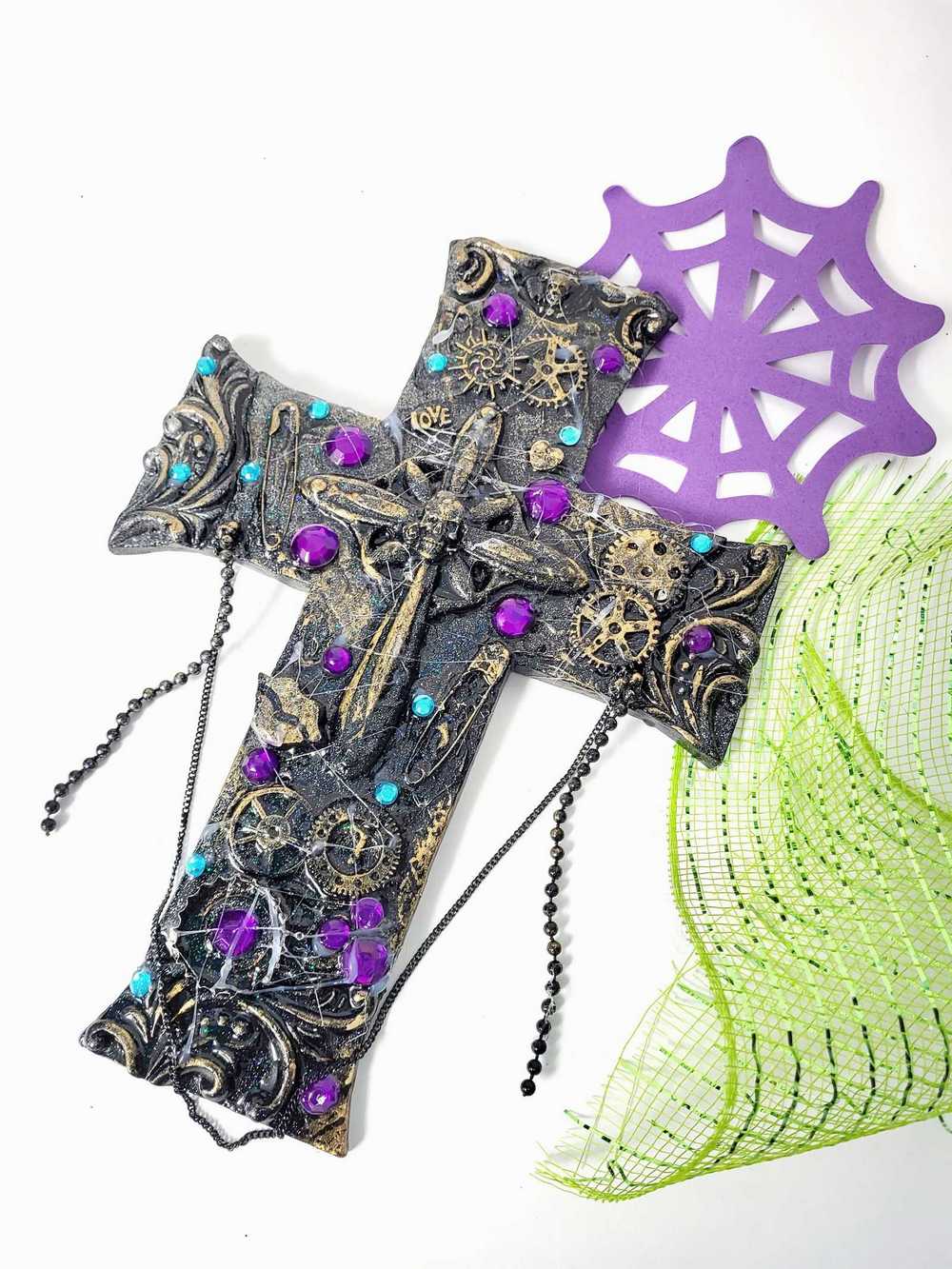 Black Cross With Skulls and Gears in Purple and Teal Rhinestones