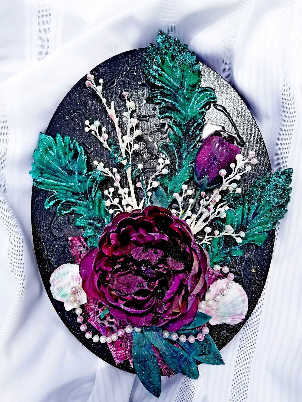 Black Oval Canvas 3D Art with Deep Purple Flowers and Shells