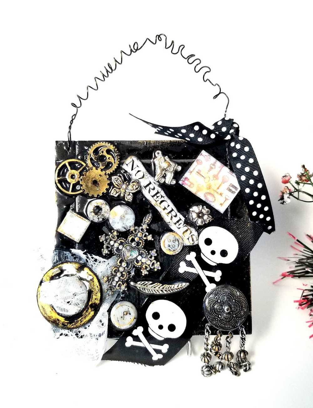 Skull & Bones Wall Plaque in Black & Gold, with Curly Wire Ribbon "No Regrets"