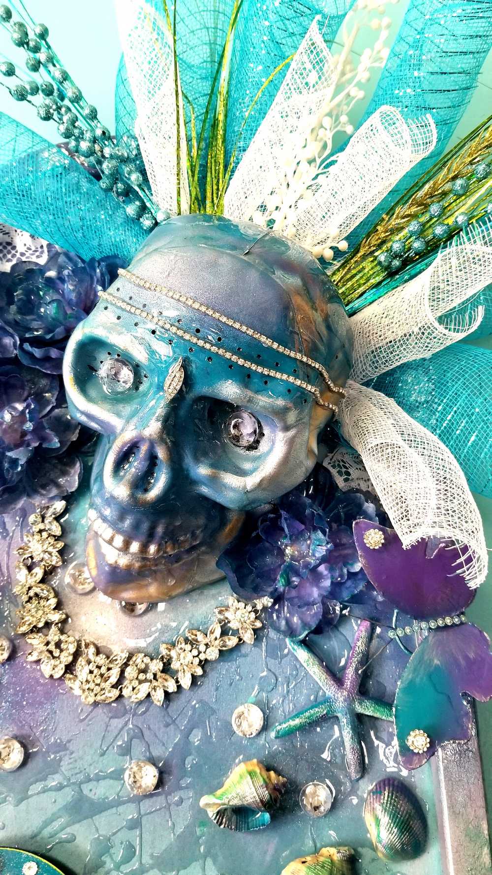 Large Teal Wood Clock with Skull and all Her Jewels, with Lights