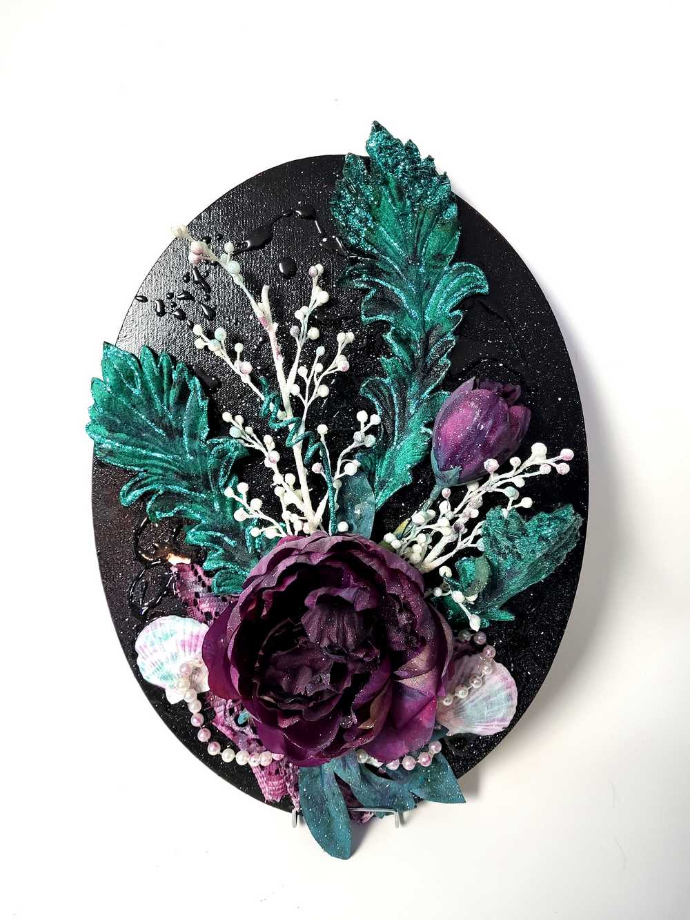 Black Oval Canvas 3D Art with Deep Purple Flowers and Shells