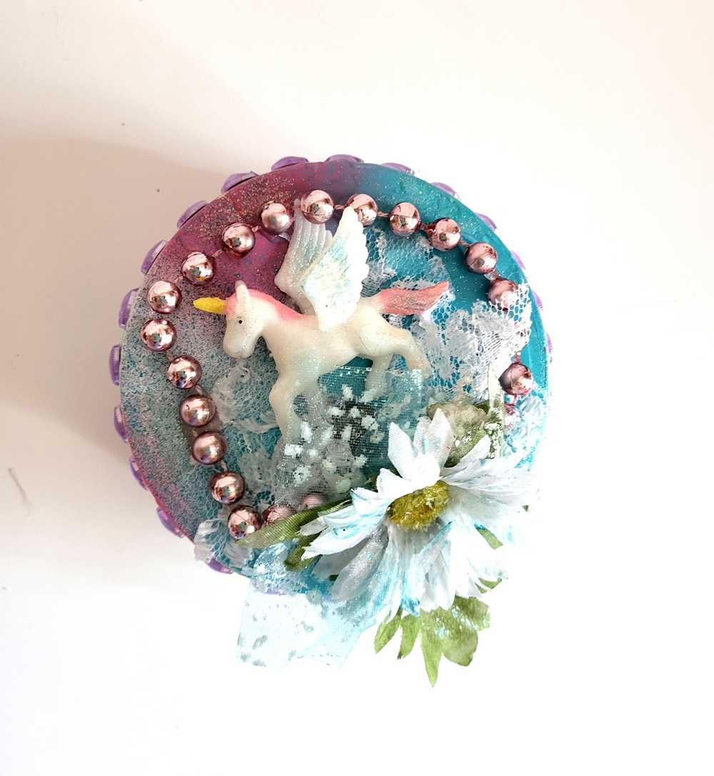 Recycled Round Jewelry Box with a Flying Pink Unicorn and a Daisy