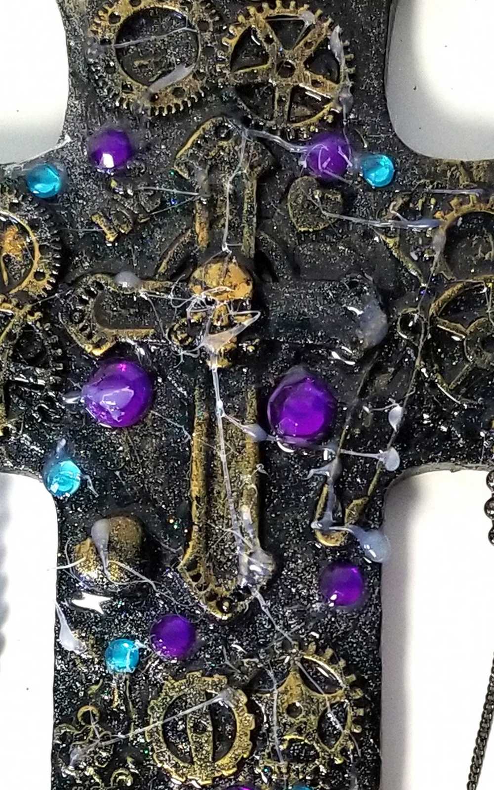 Altered Cross Made of Plaster with Skulls, Gears and Chains