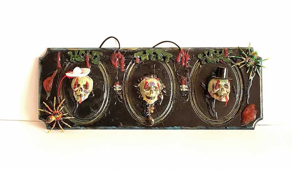 3D Family Portraits of a Handsome Skull Family on a Wall Plaque