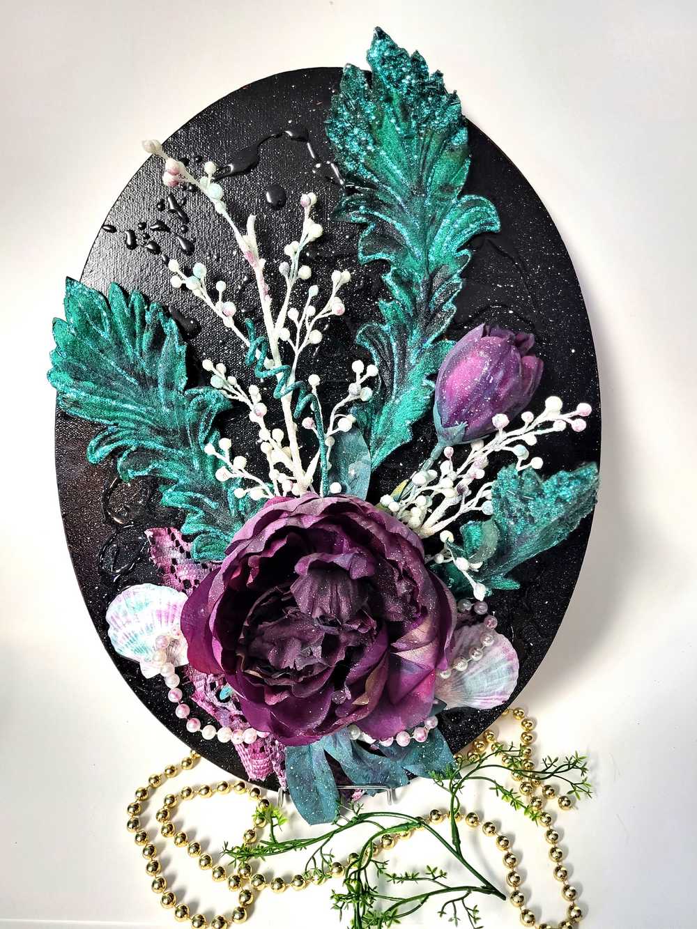 Black Oval Canvas 3D Art with Deep Purple Flowers and Shells