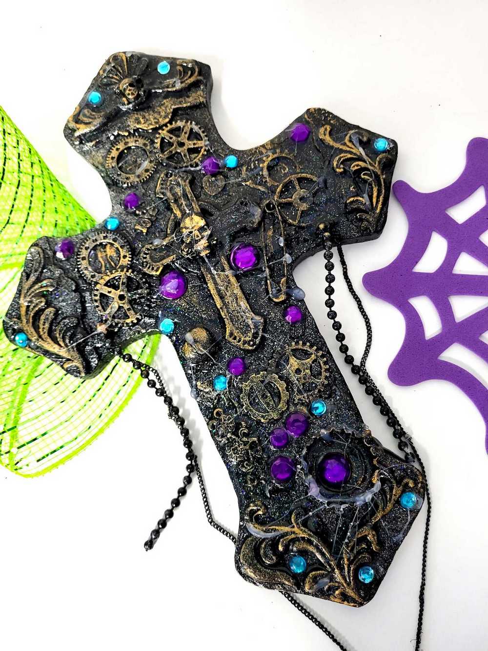 Altered Cross Made of Plaster with Skulls, Gears and Chains