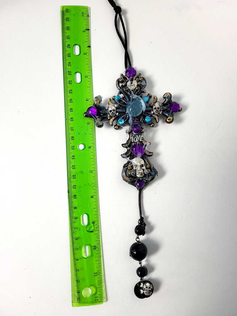 Plastic Cross and Skull Ornament with Teal and Purple Rhinestones