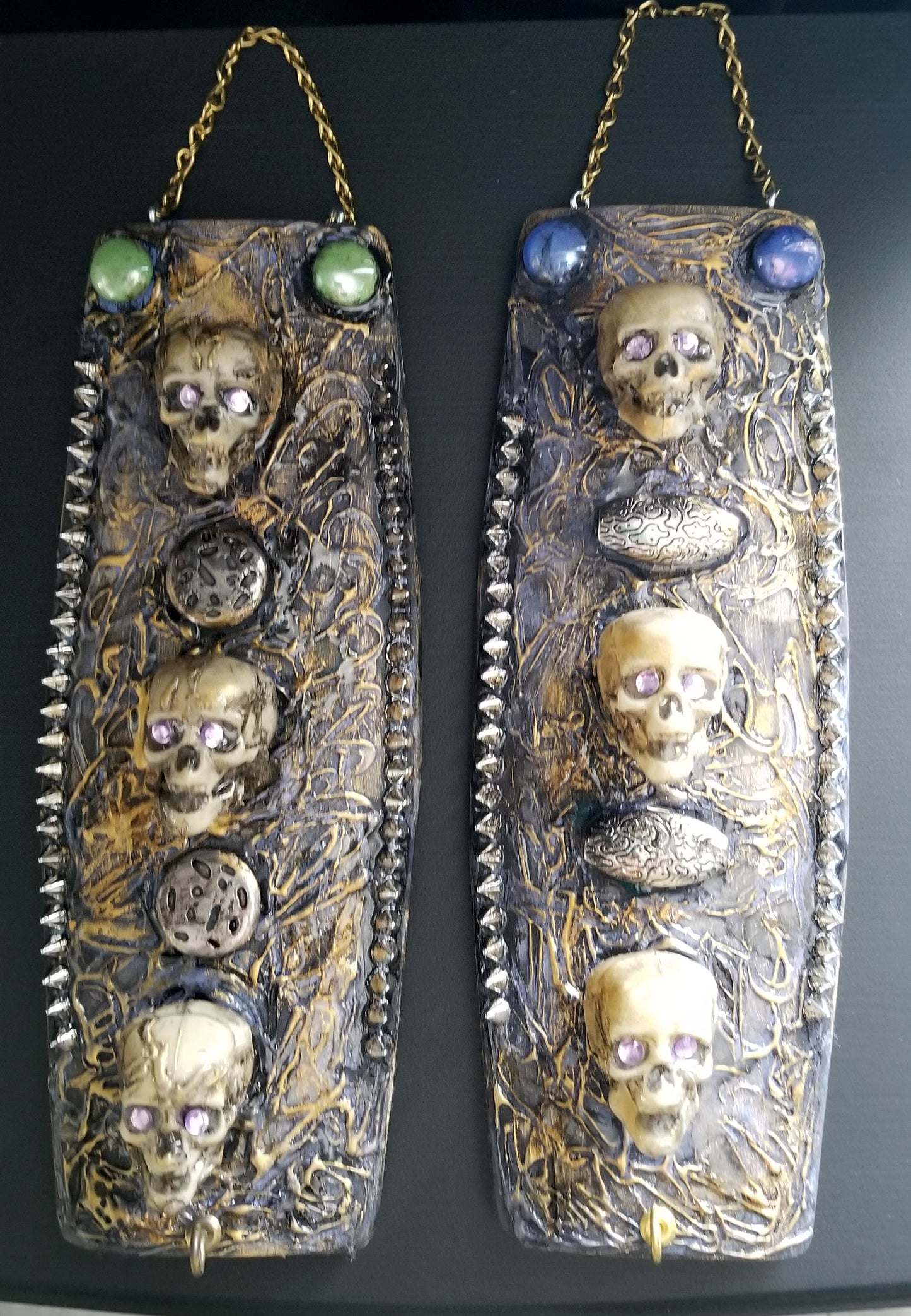 3 Skulls on a Spiked Plaque