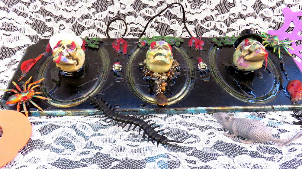3D Family Portraits of a Handsome Skull Family on a Wall Plaque