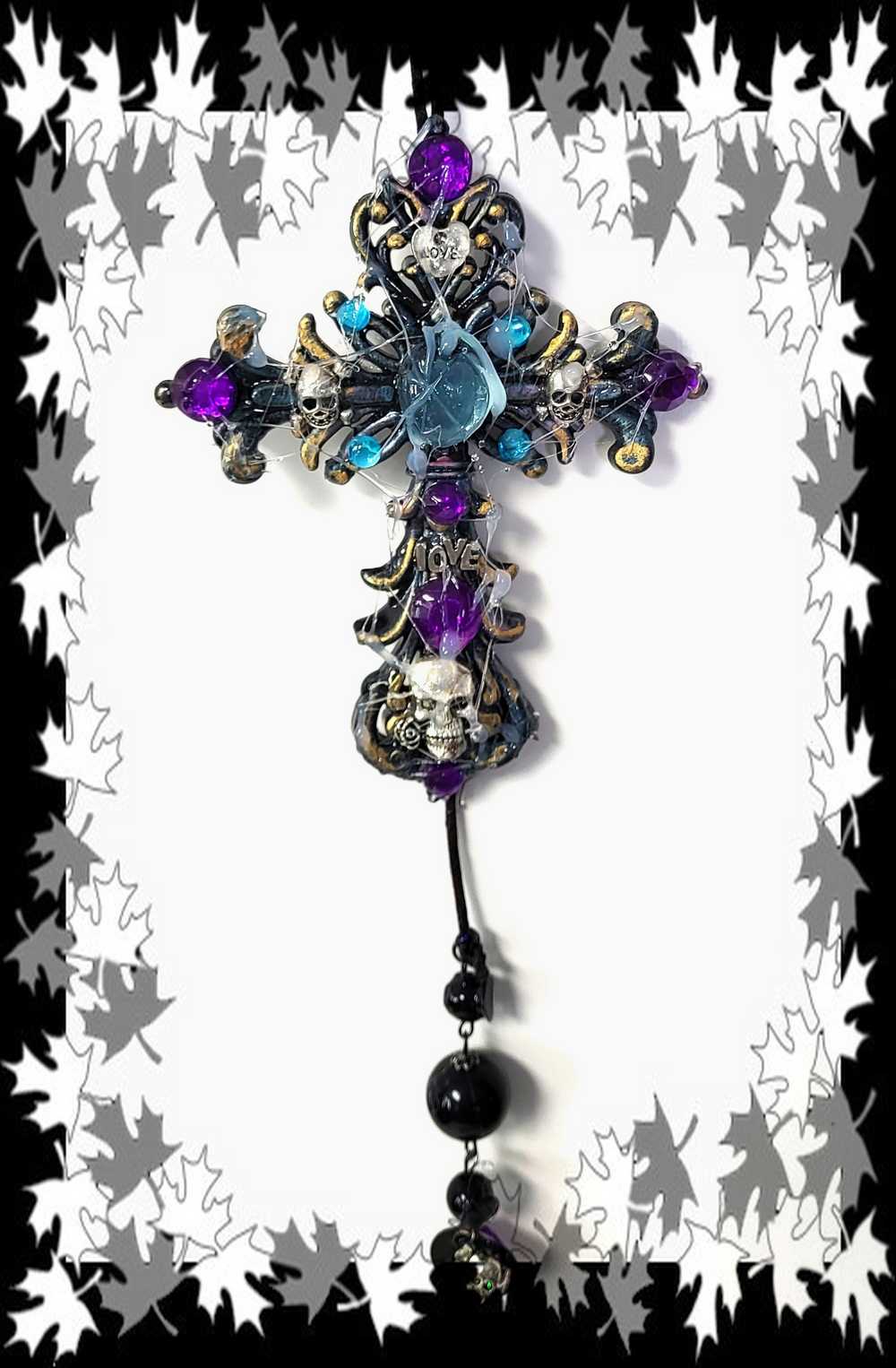 Plastic Cross and Skull Ornament with Teal and Purple Rhinestones