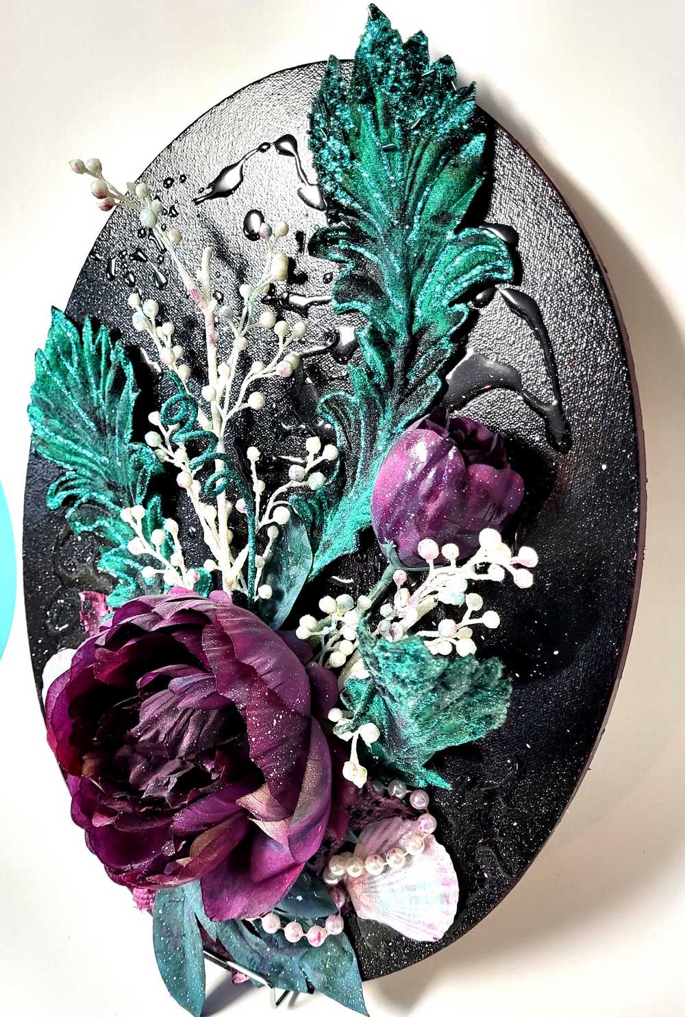 Black Oval Canvas 3D Art with Deep Purple Flowers and Shells