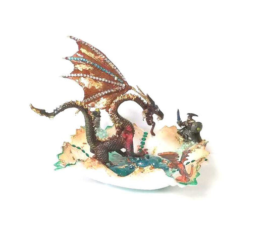 Fire-Breathing Dragon in Antique Glass Dish in a Fierce Fight for Survival