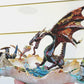 Fire-Breathing Dragon in Antique Glass Dish in a Fierce Fight for Survival