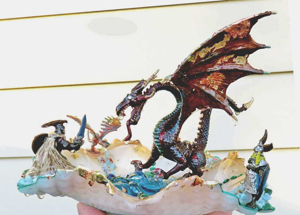 Fire-Breathing Dragon in Antique Glass Dish in a Fierce Fight for Survival