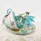 Fighting Dragons in a Vintage Teacup and Saucer Encased in Resin