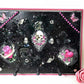 Black Goth Wall Plaque with a Skull with a Sword, Glass and Pink Butterflies