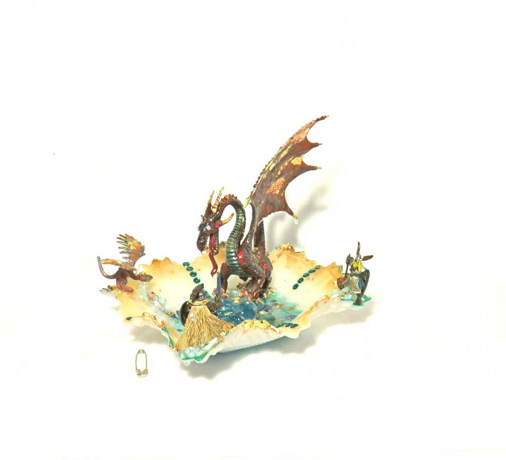 Fire-Breathing Dragon in Antique Glass Dish in a Fierce Fight for Survival