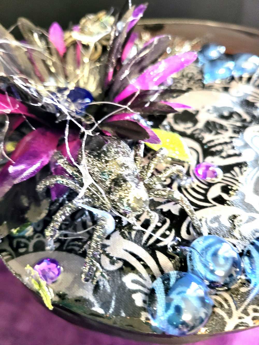 Wood Basket Covered with Black Skull Fabric, with a Purple & Black Flower, Blue Glass Cabochons & a Large Sparkley Spider