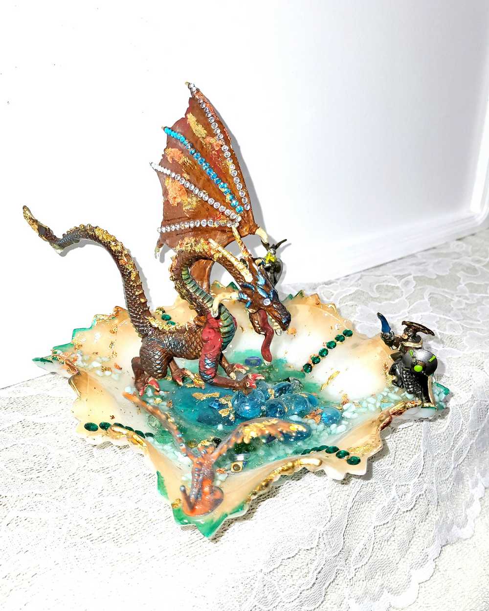 Fire-Breathing Dragon in Antique Glass Dish in a Fierce Fight for Survival