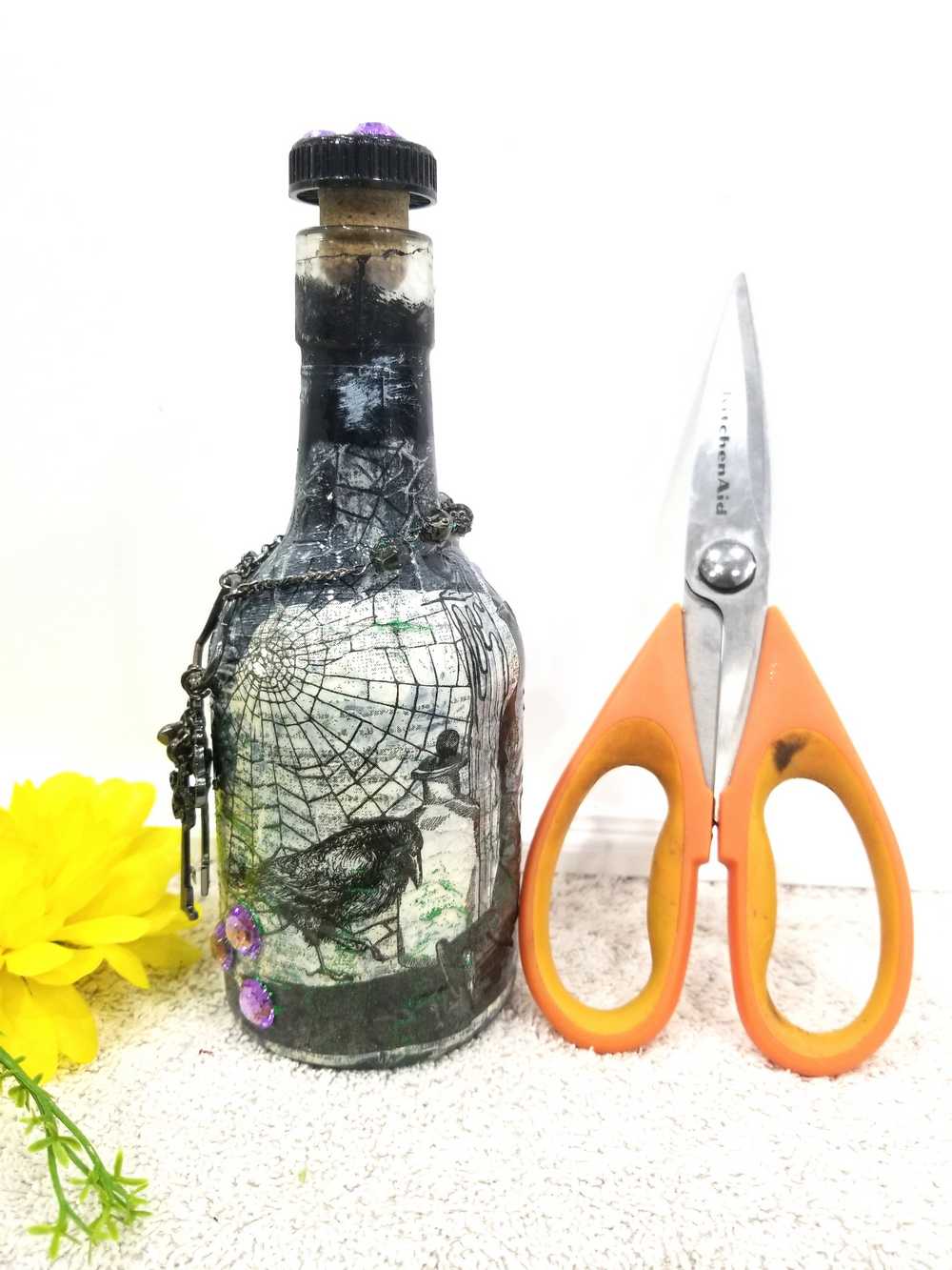 Altered Glass Bottle, Decanter, with a Crow, Chain with Keys, Purple Gems, Re-Usable